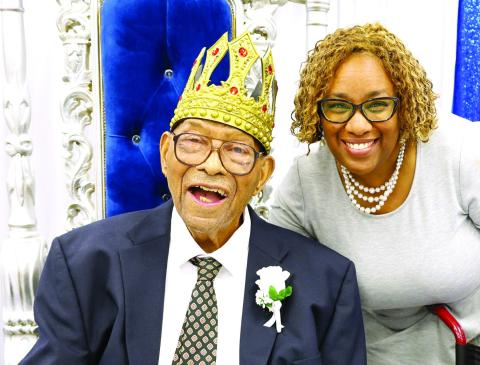 William Gilbert enjoys the celebration of his career as an educator in Putnam County. T. MICHAEL STONE/Staff