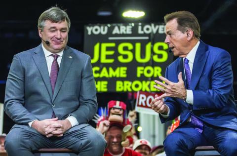 Georgia head coach Kirby Smart (left) and former Alabama head coach and ESPN analyst Nick Saban speak on College Game Day ahead of the championship game at Mercedes-Benz Stadium in Atlanta. SKYLA MORRIS/Staff