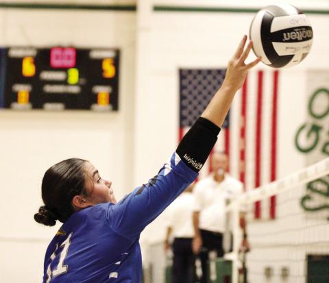 LOA outside hitter Bailey Pattison sends a ball back over the net during a match at Athens Academy last week. WILL MORRISON/Staff