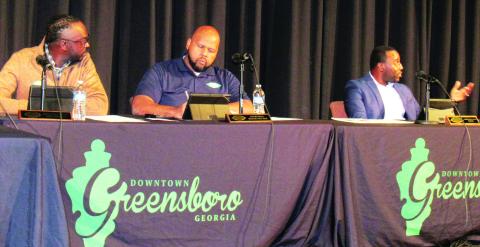 City Councilmember Jontavius Smith (left) made a motion to ask City Manager Jarvis Sims to resign. Mayor Pro-Tem David Neal (center) seconded the motion. Mayor Corey Williams (right) rejected the motion as out of order. MARK ENGEL/Staff