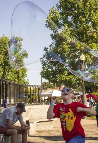 Firefly Festival’s “Kids Night” featured various activities for participants, including face painting, petting zoos, and lots of giant bubbles. SKYLA MORRIS/Staff