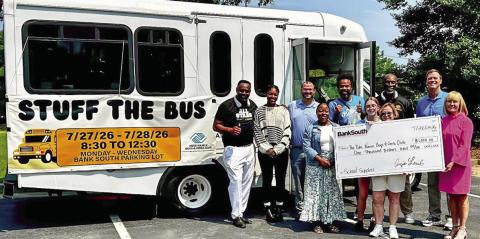 BankSouth representatives contributed a $1,000 donation to the Pete Nance Boys &amp; Girls Club’s recent “Stuff the Bus” campaign. CONTRIBUTED