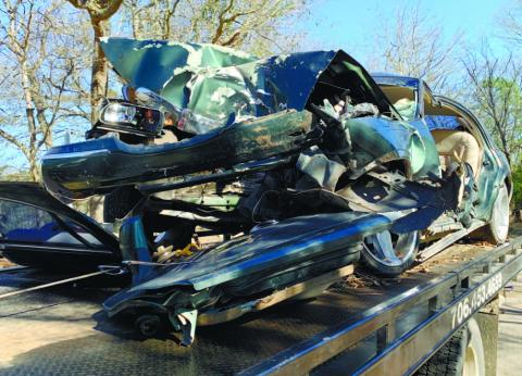 The vehicle driven by Cynthia McClelland struck a tree to end a five-mile pursuit. CONTRIBUTED