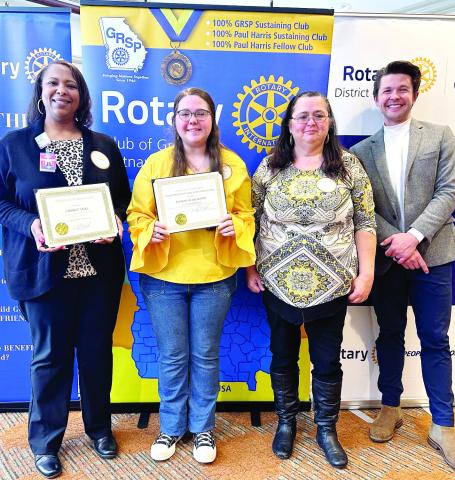 L-R: Dr. Candice Veal, Claudia Franklin,and Wanda Nix of Putnam County High School pose with Dr. Tyler Franks. CONTRIBUTED