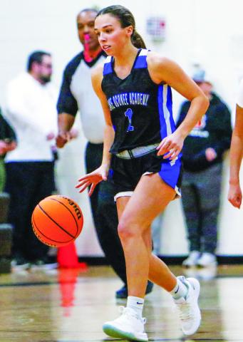 Lake Oconee Academy’s Beth Harris (1) dribbles past Greene County’s Dajah Hobes (3) in transition. LANCE MCCURLEY/Staff