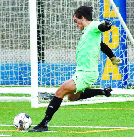 Titans’ keeper Knox van Mol (00) sends the ball toward the center on a goal kick against Washington-Wilkes earlier this season. BRENDAN KOERER/Staff