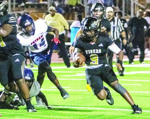Greene County running back Amari Durham (9) has rushed a team’s second-best 344 yards and three touchdowns through five games. LANCE McCURLEY/Staff