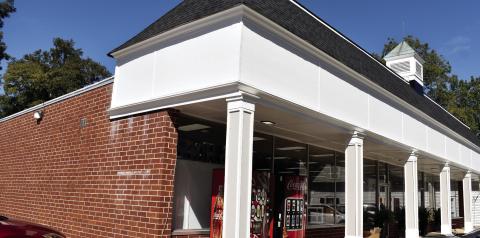 The Madison Drug Company sought to paint the brick wall on the Thomason street side of their building either white or gray. T. MICHAEL STONE/Staff