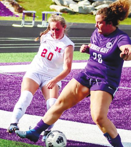 Morgan County’s Grace McClendon (20) tries to steal the ball away from a Cherokee Bluff player. LANCE McCURLEY/Staff