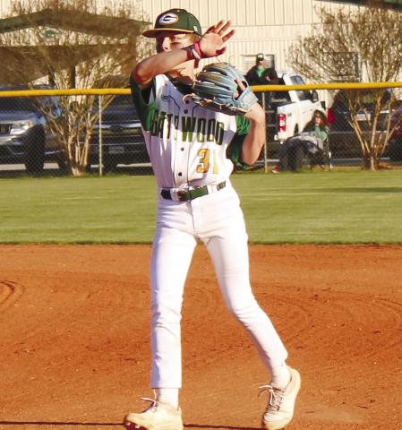 Drew Love (31) throws out a runner from second base. TREY NORRIS/Staff