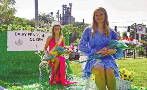Dairy Festival Queen Lily Frisch and first runner up Erin Harvey prepare to ride in the parade. BAILEY BALLARD/Staff