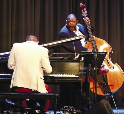 Nick Rosen on the piano and Kevin Smith on bass hit the right notes.