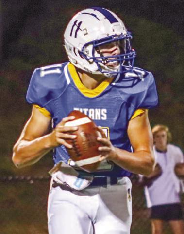 LOA senior Garrett Payne (11) looks for a passing outlet during a game against Cherokee Christian earlier this season. LANCE McCURLEY/Staff