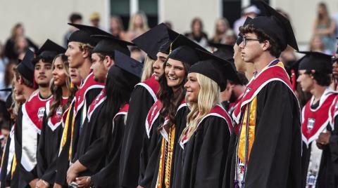 Morgan County High School students stand during the ceremony. (SKYLA MORRIS/Staff)