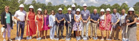 St. Mary’s and community leaders pose for a photo to celebrate breaking ground for St. Mary’s Good Samaritan Pavilion. LEIGH LOFGREN/Staff