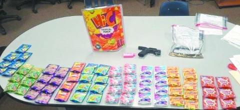 Discovered in the vehicle were a Glock 45 and 63 individually packaged marijuana products. CONTRIBUTED