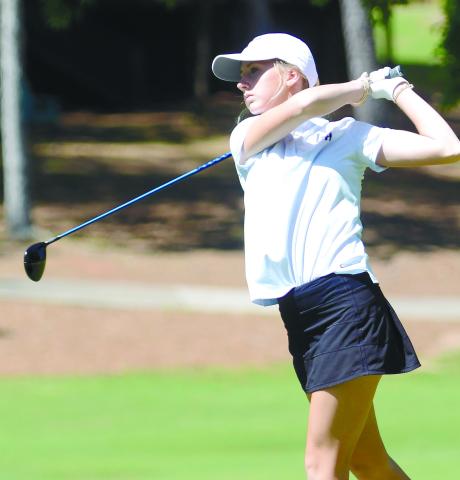Kallyn Black tracks her ball off the first tee box as she started her day at Harbor Club for the Titans’ area golf tournament last week. BRENDAN KOERNER/Staff
