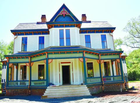 Contractors are putting the finishing touches on the Foster-Thomason-Minnix House ahead of Derby Day. T. MICHAEL STONE/ Staff