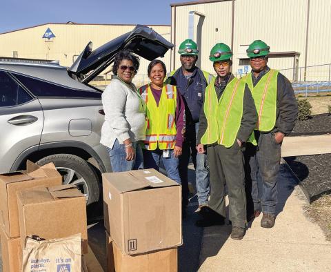 Sherry Terrell, director of the Madison-Morgan Community Food Pantry, with Georgia-Pacific employees Jackie Dillon, Donald Davis, KeMonta Heath, and Dock Veasley. CONTRIBUTED