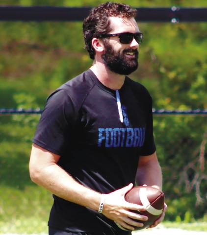 Titans’ head coach Patrick Stewart is all smiles during summer workouts with his program. BRENDAN KOERNER/Staff