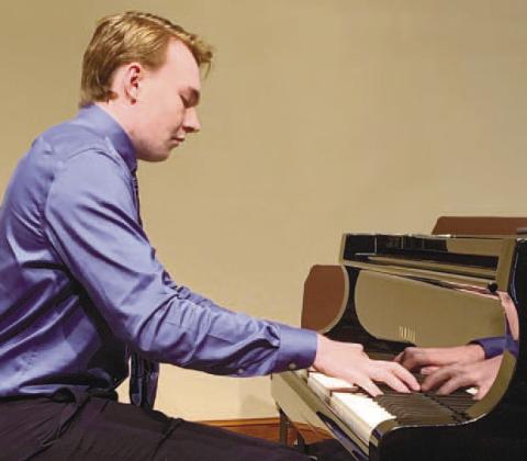 Carter Cadwallader performed at Greensboro’s Festival Hall to help raise funds for a piano purchase. CONTRIBUTED