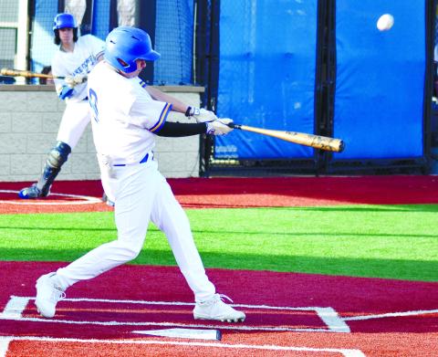 LOA infielder Cameron Kelley (8) drives a ball into right in last week’s 11-1 win over Lincoln County. T. MICHAEL STONE/Staff