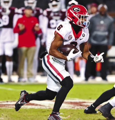 Georgia running back Kenny McIntosh has 568 rushing yards on the season and 7 touchdowns. He has also made an impact as a receiver with 341 yards and another TD. ROB DAVIS/UGA Athletics