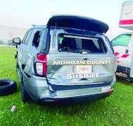 Morgan County Sheriff's Office SUVs sustained severed damage after being hit by and SUV on I-20. (CONTRIUBTED)