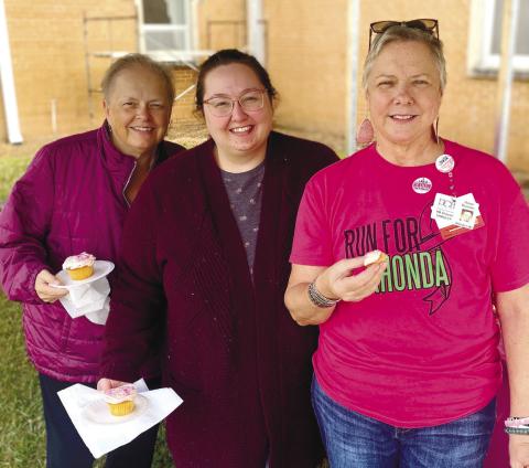 Susan Hobbs and Caitlin Sims, pose with cancer survivor Rhonda Cabe. CONTRIBUTED