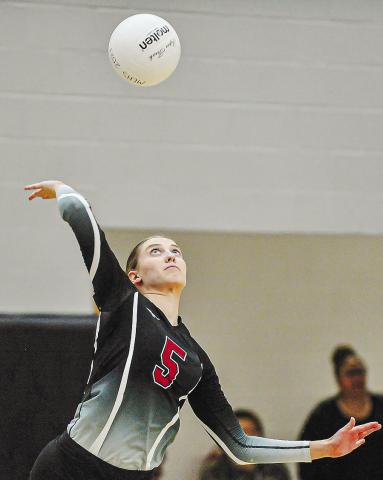 Haedyn Crumbley (5) who recently got back from a knee injury, gets ready to hit the ball over the net in last week’s playoff match. CHARLES JORDAN/Staff