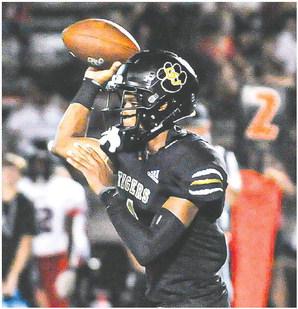Greene County quarterback Steve Miller gets set to throw a pass downfield to an open receiver against Morgan County on Aug. 25. CHARLES JORDAN/Contributed
