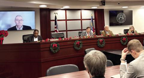 The Georgia Public Service Commission, with member Tim Echols attending remotely, voted Friday, Dec. 19, 2025 to let Georgia Power add nearly 10 gigawatts of capacity, a massive expansion that will cost billions of dollars. TY TAGAMI/Capitol Beat