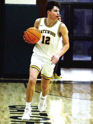 Matt Allen, the team's leading scorer, brings the ball up the floor in a game earlier this season. IAN TOCHER/Staff