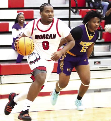 Ryan Moore (0) joined the ‘Dogs from Newton High School. Moore is leading the team in points, averaging 16. 6 per game. LANCE McCURLEY/Staff