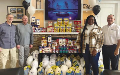 The Alliance Home &amp; Land Group donated 48 turkeys and non-perishable food to Putnam Christian Outreach and the Greene County Food Pantry. CONTRIBUTED