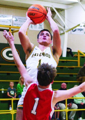 Gatewood senior Ames Johnson had a solid game for the Gators Monday night in his first game back as a basketball player since he was a freshman. IAN TOCHER/Staff