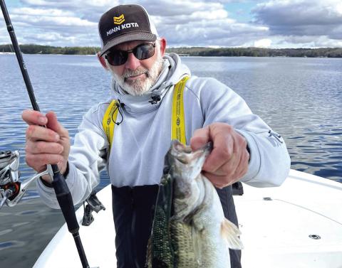 Capt Mack with a Spotted Bass on Lake Lanier. CONTRIBUTED