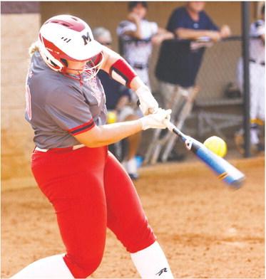 Bulldogs’ senior Ryan Henderson mashes a single up the middle in a loss to Prince Avenue on Aug. 31. LANCE McCURLEY/Staff