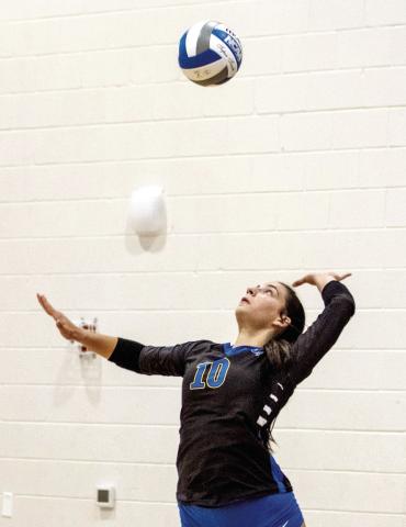 LOA junior Emma Dimascio gets set to serve a ball in match earlier this season. SKYLA MORRIS/Staff