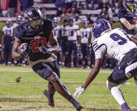 Morgan County running back Christian Monfort (23) rushed for 102 yards on 18 carries and two touchdowns in a win over Miller Grove last Friday. SKYLA MORRIS/Staff