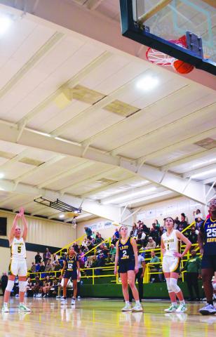 Freshman Bela Smith scored the game-winning basket with this free throw that put the Lady Gators up 33-32 over the visiting Lady Cavs from Mount de Sales. Gatewood won the game 36-32. IAN TOCHER/Staff