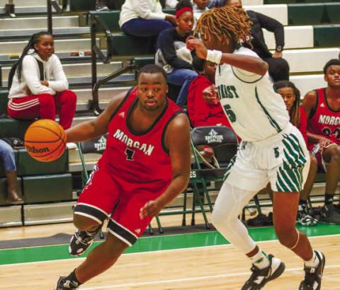 Morgan County forward Jaturi Brown (1) drives the lane in a loss earlier this season to Eastside. LANCE McCURLEY/Staff