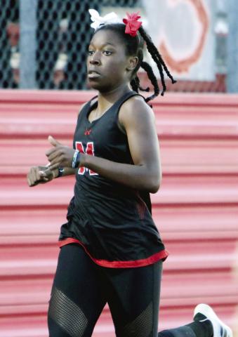 Gabrielle Massey will represent the Lady Dogs at the Class AA state meet by competing in the 4x200 and the 4x400-meter relay races. LANCE McCURLEY/Staff