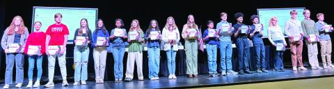 Middle school and high school students selected for the All-State Band and All-State Chorus are recognized. HANNAH BARRON/Staff
