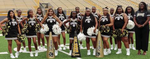 The Greene County cheerleading squad is preparing to take the next step into competitive cheer under head coach Aleah Callaway (far right). CONTRIBUTED