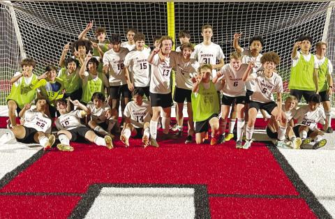 The Bulldogs pose for a photo after defeating Harlem 2-0 last week to capture their third straight Region 4-AAA title. CONTRIBUTED