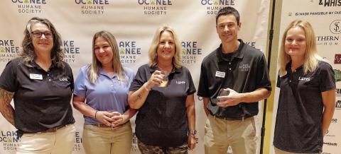 L-R: Executive Director of the Lake Oconee Humane Society Diane Robertson, with staff members Kaly Cave-Bigley and Tammy Ellis, LOHS veterinarian Dr. Andrew Duncan, and Molly Rowland. LEIGH LOFGREN/Staff
