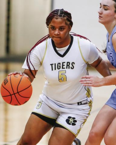 Greene County head coach Steven Hopper praised junior Denver McCommons (5), who is averaging more than 20 points per game over the past five contests. LANCE McCURLEY/Staff