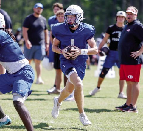 LOA’s offense will succeed if quarterback Jake McDonald (1) can deliver in a new system. LANCE McCURLEY/Staff