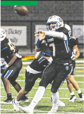 LOA quarterback Ike O’Neal (7) throws as pass on the run as he’s flushed out of the pocket. CHARLES JORDAN/Staff